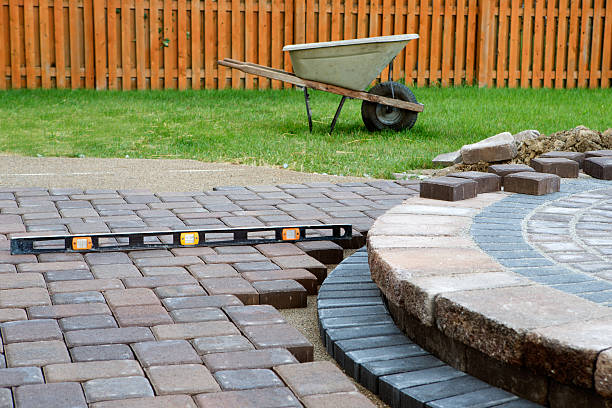 When building a patio prepare to use level and barrel constantly, patio island have polymeric sand layed and job completion almost done when final pavers cut and placed